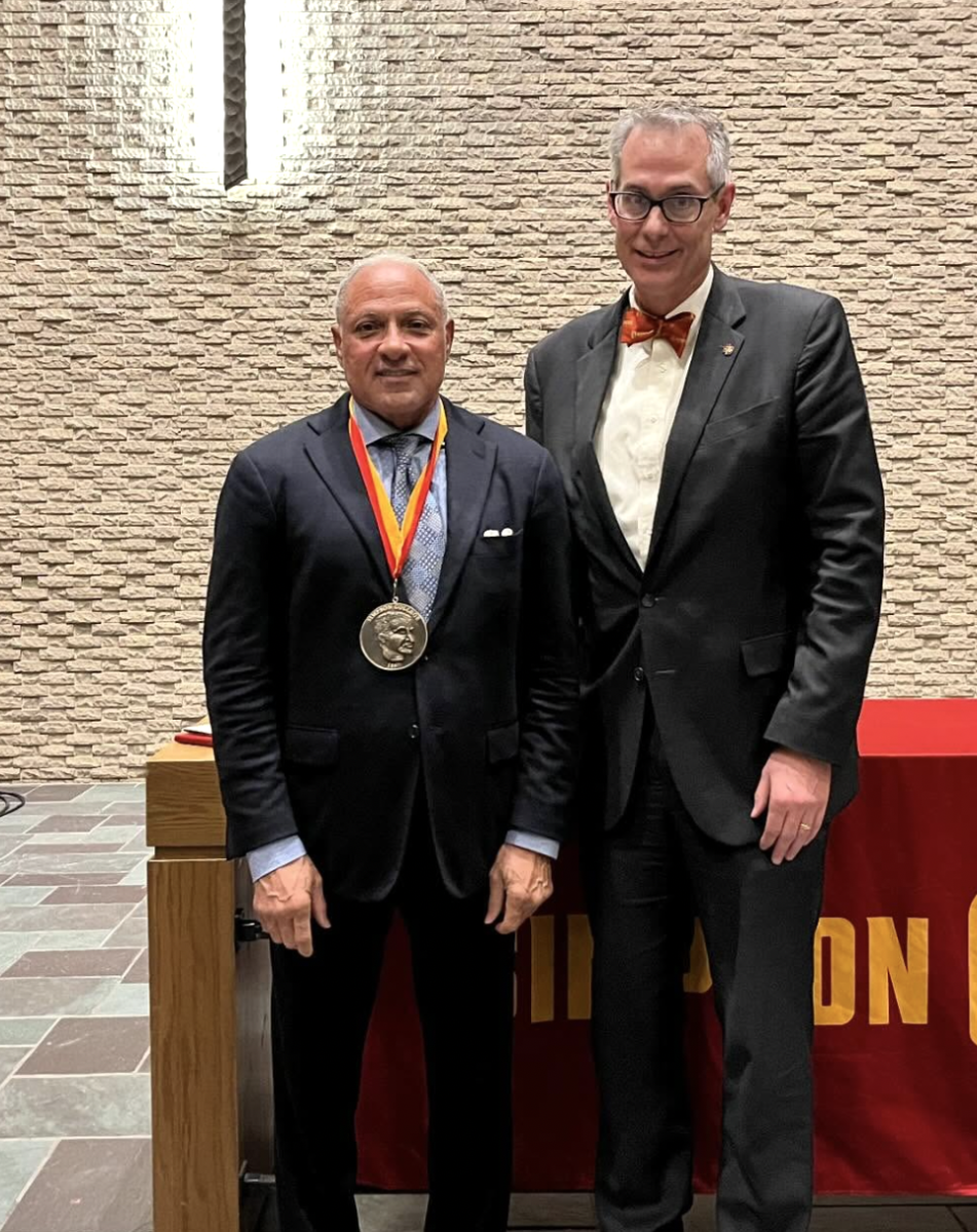 President Byers bestows former Secretary of State Mike Espy the Carver Medal